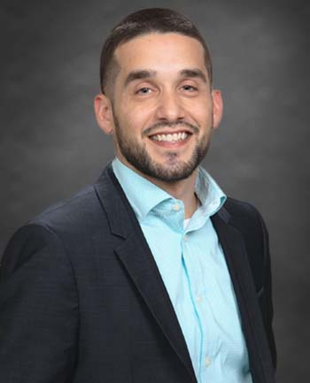 Headshot of Adam Figueroa