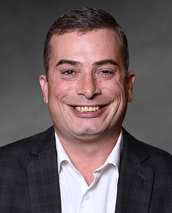 Headshot of Claude Maher