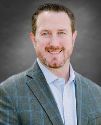 Headshot of Scott Binsfeld