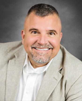 Headshot of Michael Raines