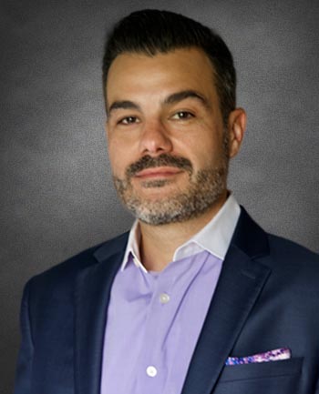 Headshot of Marc Austin