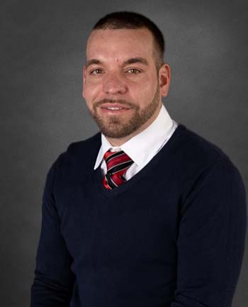 Headshot of Alex Roman