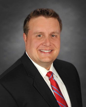 Headshot of Brett Stevens