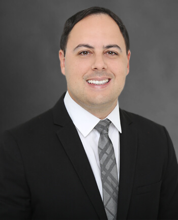 Headshot of Tiago Quinamo