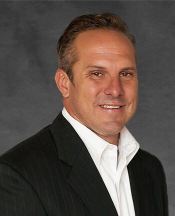 Headshot of Eric Whitcomb