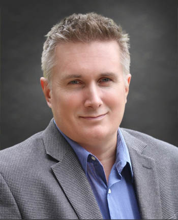 Headshot of Shad Carson